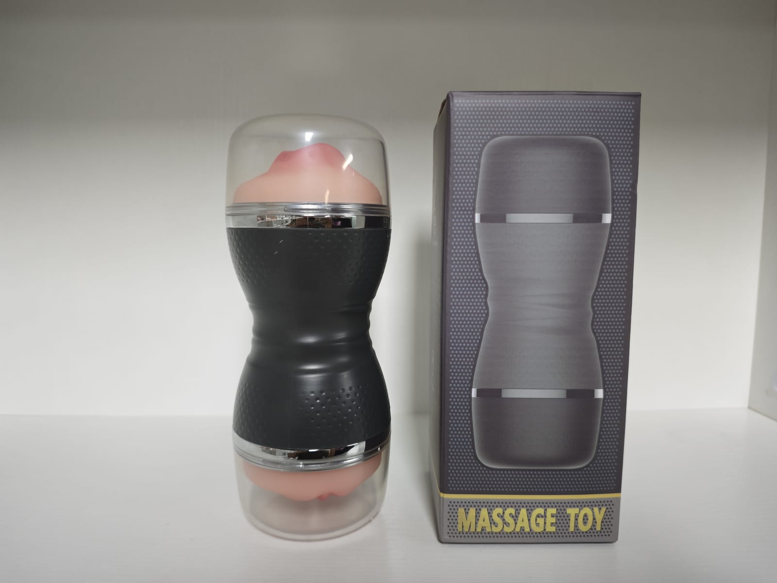 D23 dual-head personal device with clear protective caps and retail packaging